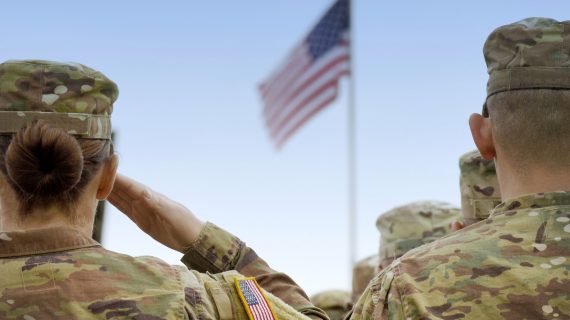 American Soldiers Saluting US Flag